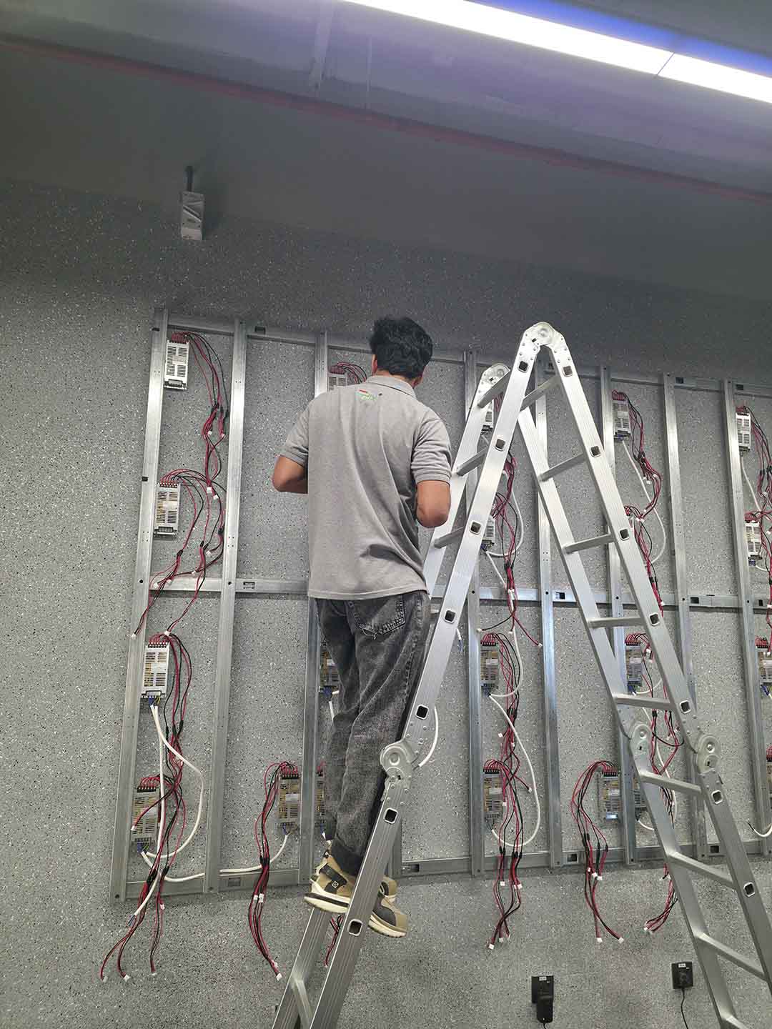 Installation of LED screen power supplies for MyPT Fitness Center Abu Dhabi