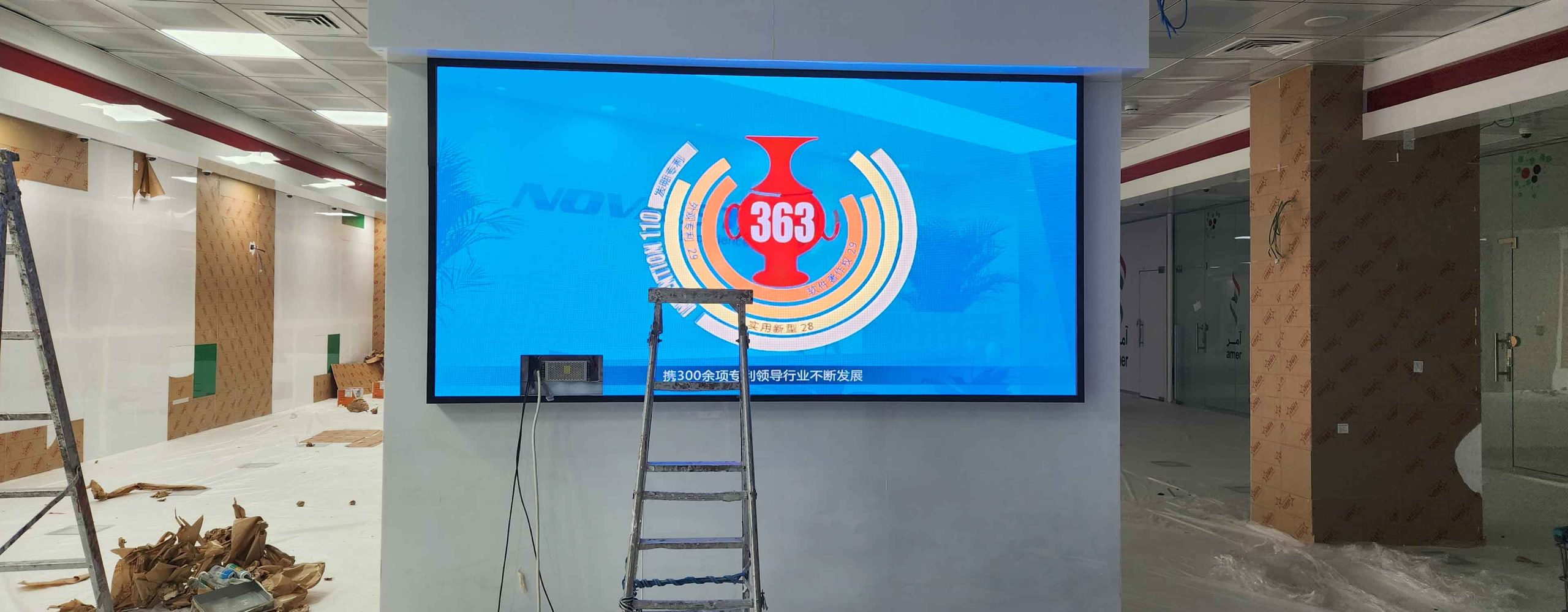 P1.8 LED screen powered on during installation at Amer Center in Bin Shabib Mall