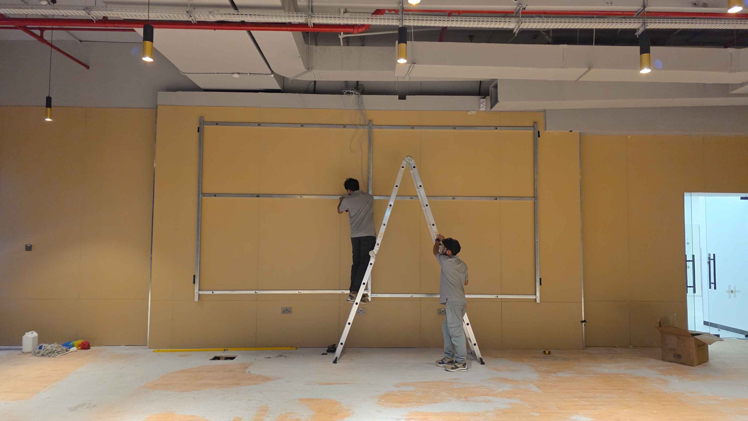 Metal frame installation for LED display project at MyPT Fitness Center Abu Dhabi